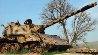 Image © M Torres - destroyed tank in Iraq