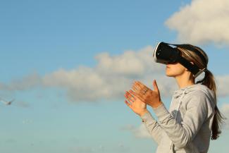 Woman with Virtual Reality goggles